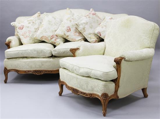 A French carved beech three piece salon suite,